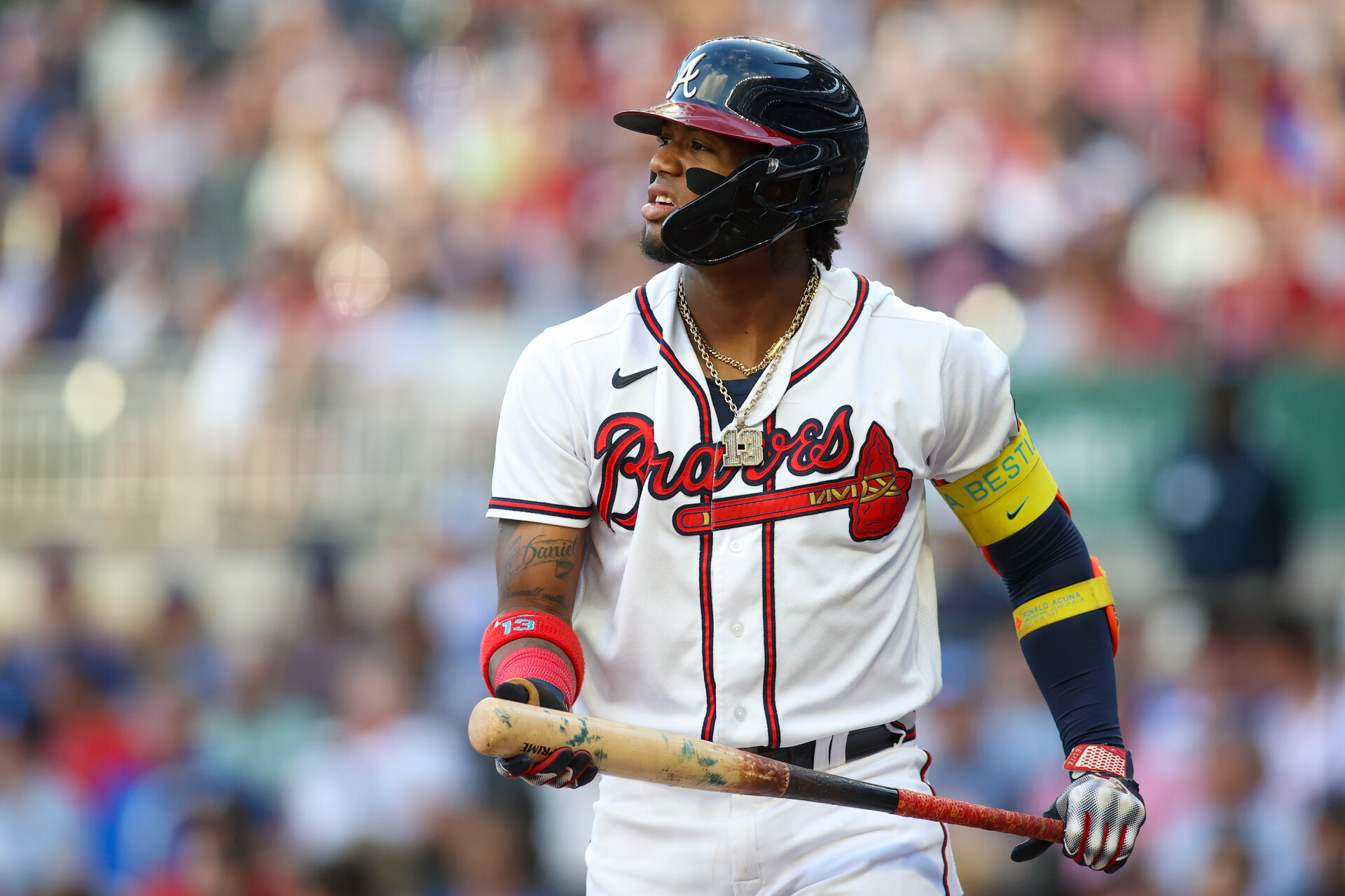 Aug 16, 2023; Atlanta, Georgia, USA; Atlanta Braves right fielder Ronald Acuna Jr. (13) reacts after a pitch against the New York Yankees in the first inning at Truist Park.
