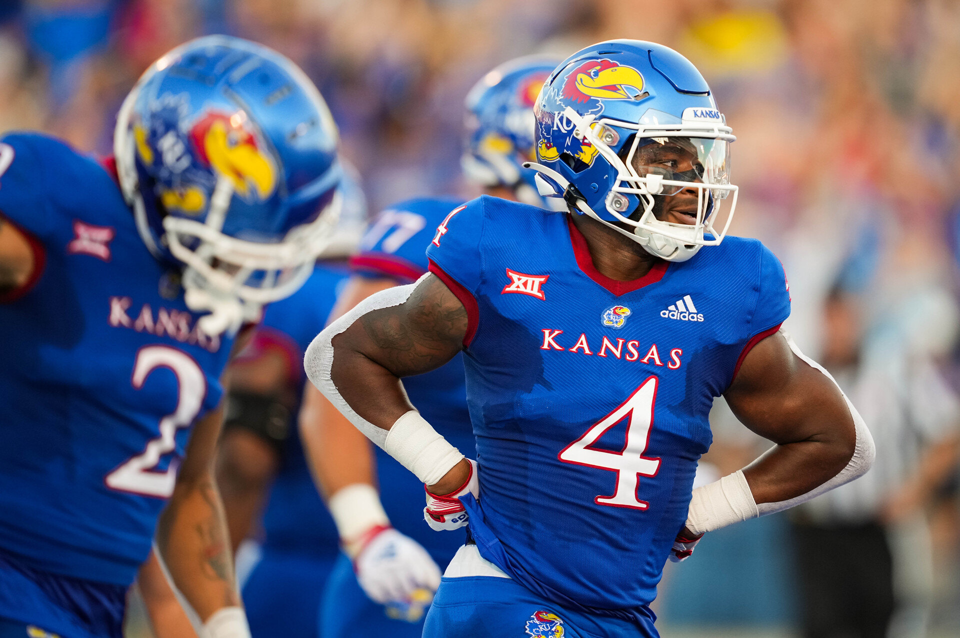 Kansas Jayhawks running back Devin Neal (4) celebrates after scoring a touchdown against the Tennessee Tech Golden Eagles during the first half at David Booth Kansas Memorial Stadium.