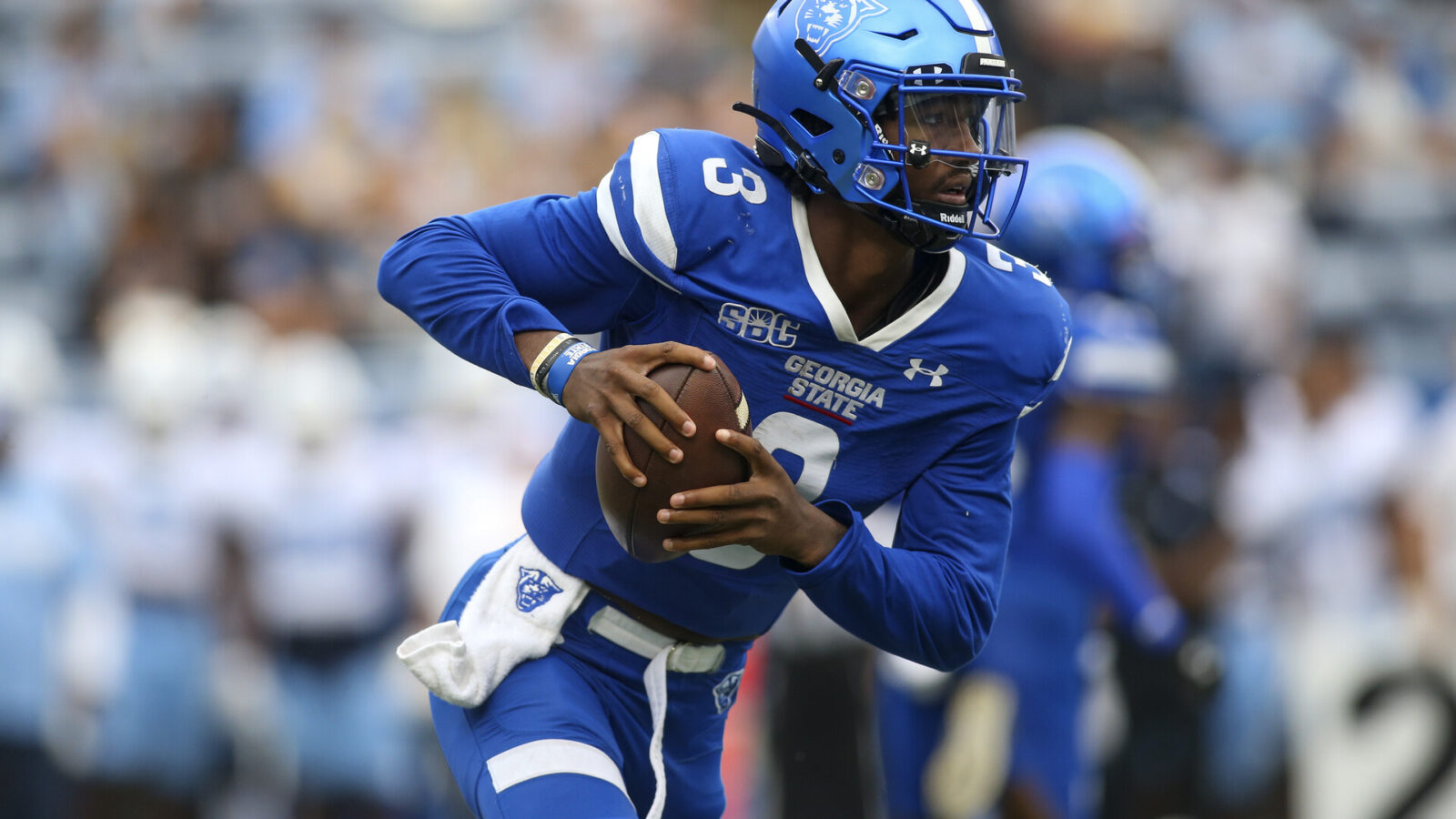 Georgia State Panthers quarterback Darren Grainger (3) runs the ball against the North Carolina Tar Heels in the first half at Center Parc Stadium.