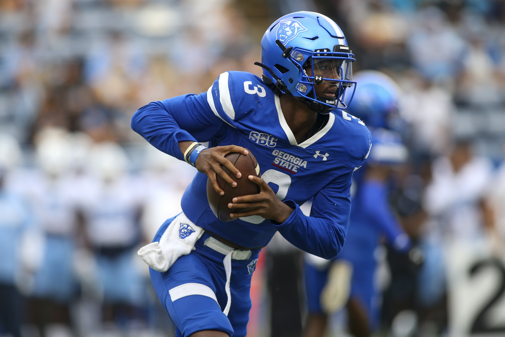 Georgia State Panthers quarterback Darren Grainger (3) runs the ball against the North Carolina Tar Heels in the first half at Center Parc Stadium.