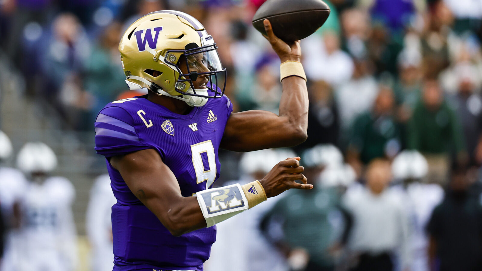 Washington Huskies quarterback Michael Penix Jr. (9) passes against the Michigan State Spartans during the first quarter at Alaska Airlines Field at Husky Stadium.