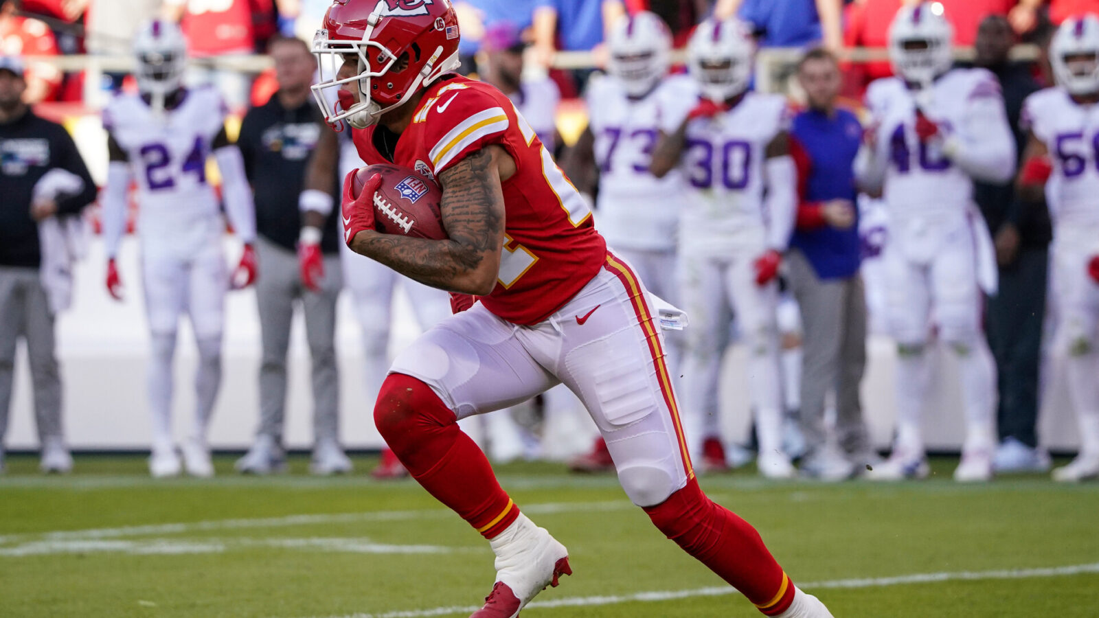 Oct 16, 2022; Kansas City, Missouri, USA; Kansas City Chiefs wide receiver Skyy Moore (24) returns a kick against the Buffalo Bills during the first half at GEHA Field at Arrowhead Stadium.