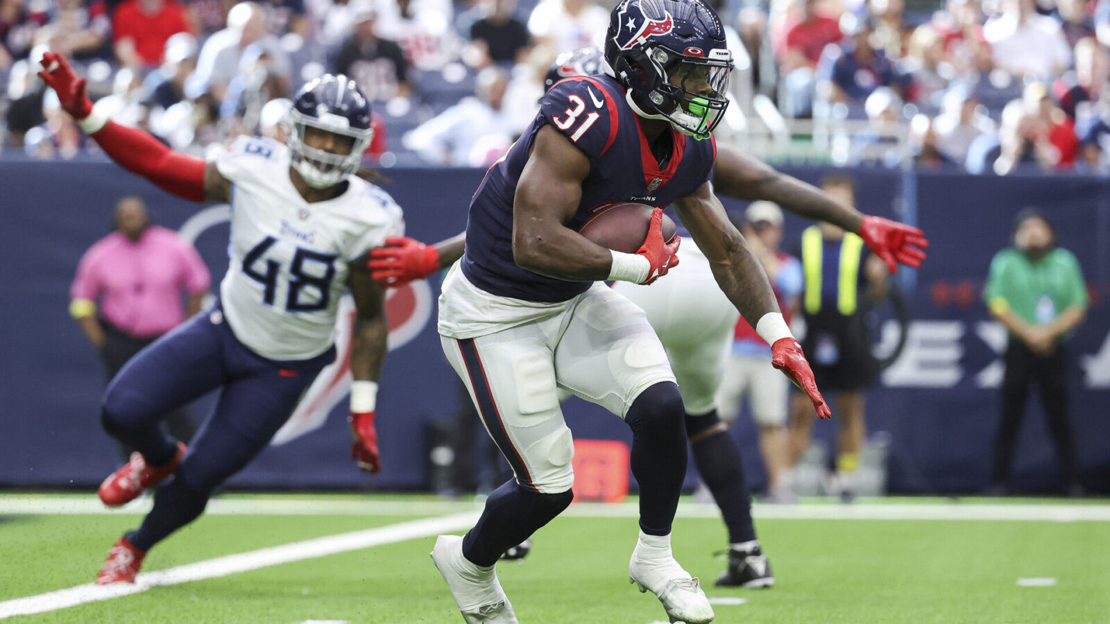 Oct 30, 2022; Houston, Texas, USA; Houston Texans running back Dameon Pierce (31) runs with the ball during the game against the Tennessee Titans at NRG Stadium.