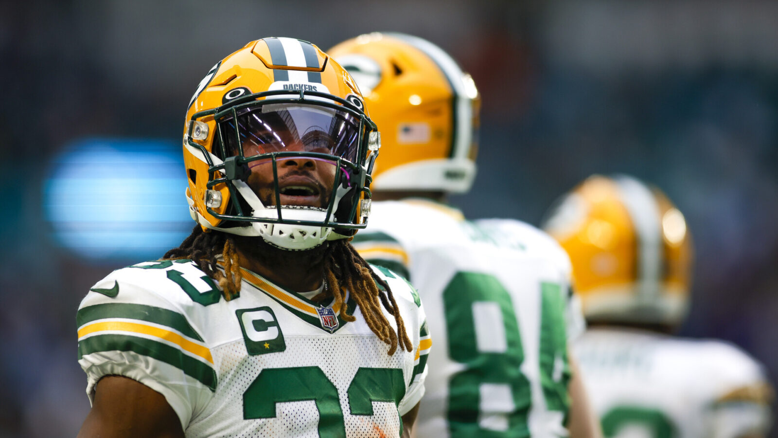 Green Bay Packers running back Aaron Jones (33) looks on from the field after running with the football during the fourth quarter against the Miami Dolphins at Hard Rock Stadium.