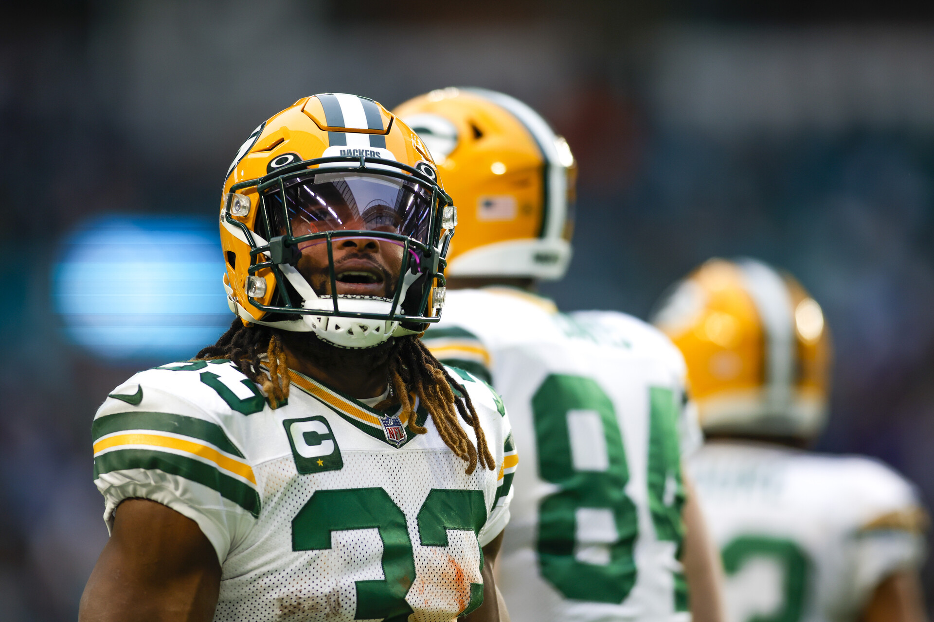Green Bay Packers running back Aaron Jones (33) looks on from the field after running with the football during the fourth quarter against the Miami Dolphins at Hard Rock Stadium.
