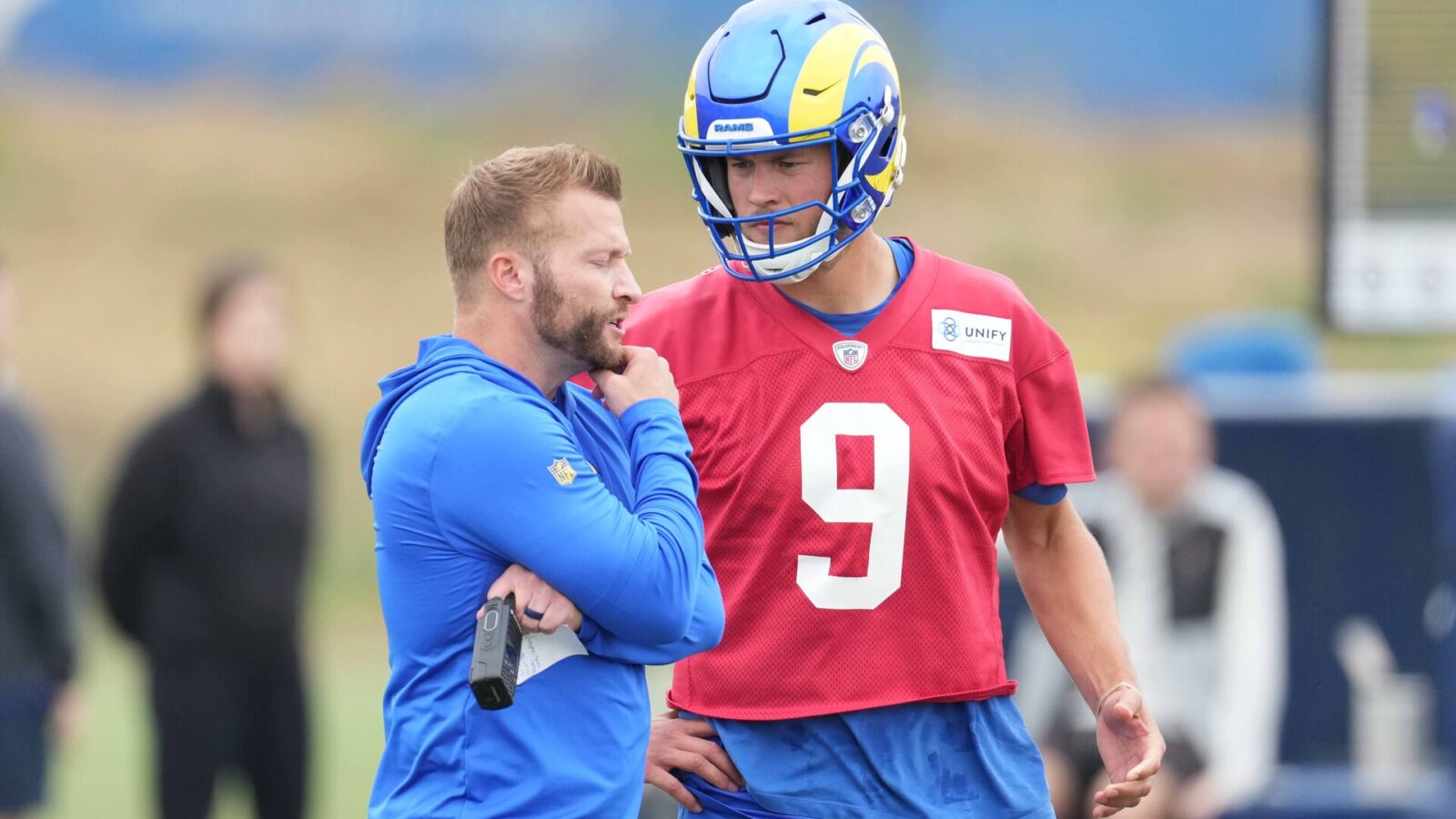 Jun 14, 2023; Thousand Oaks, CA, USA; Los Angeles Rams quarterback Matthew Stafford (9) and coach Sean McVay during minicamp at Cal Lutheran University.