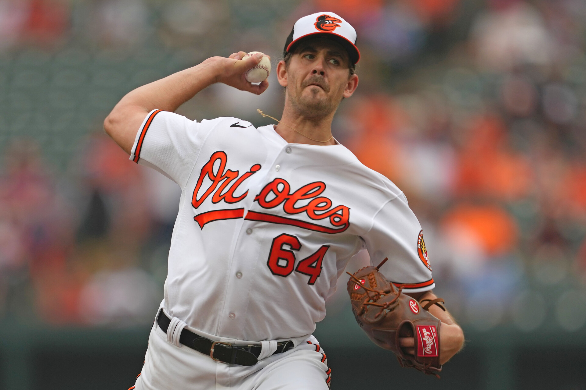 Aug 10, 2023; Baltimore, Maryland, USA; Baltimore Orioles pitcher Dean Kremer (64) delivers in the first inning against the Houston Astros at Oriole Park at Camden Yards