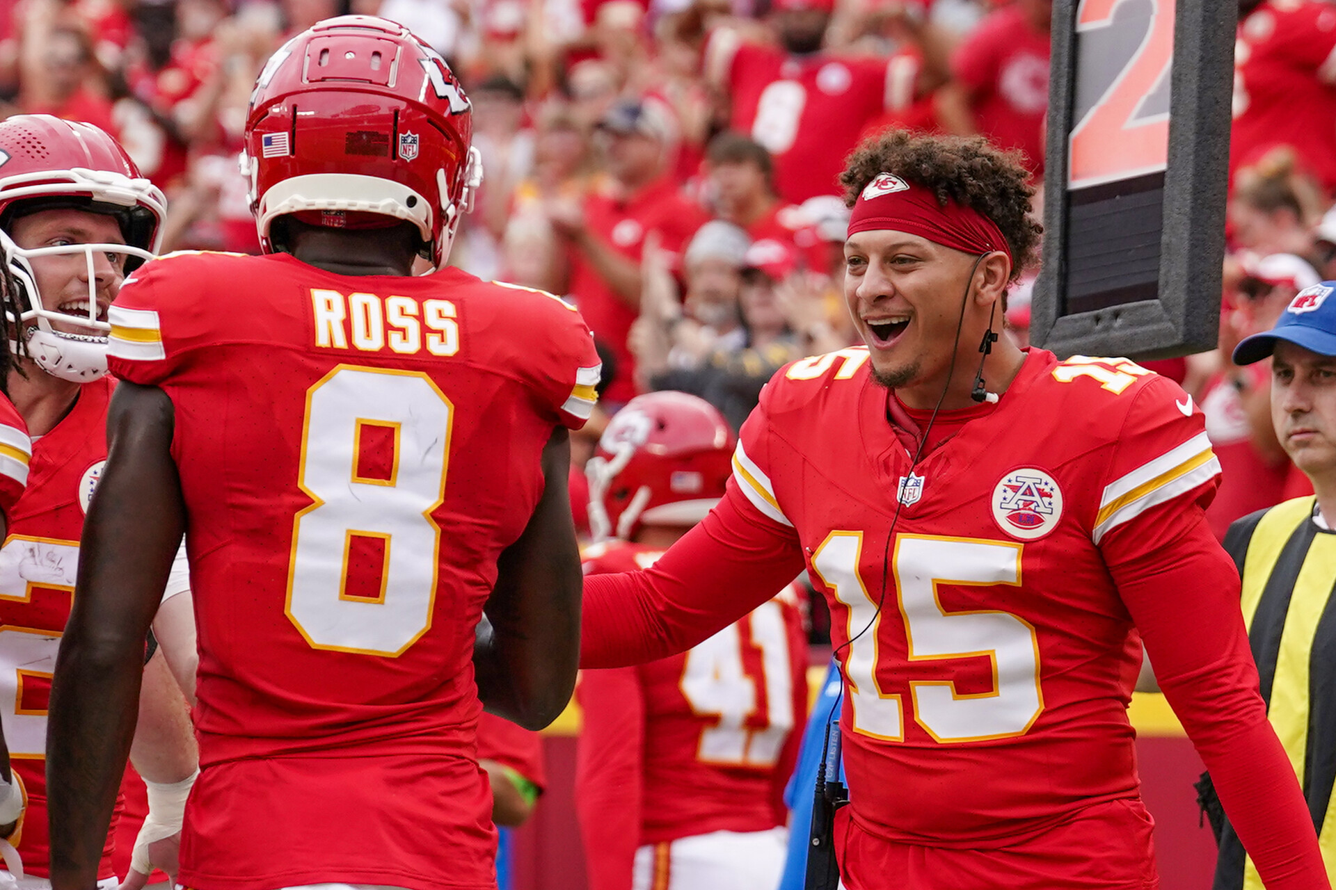 Apps Like PrizePicks: Kansas City Chiefs quarterback Patrick Mahomes celebrates on the sideline during an NFL game.