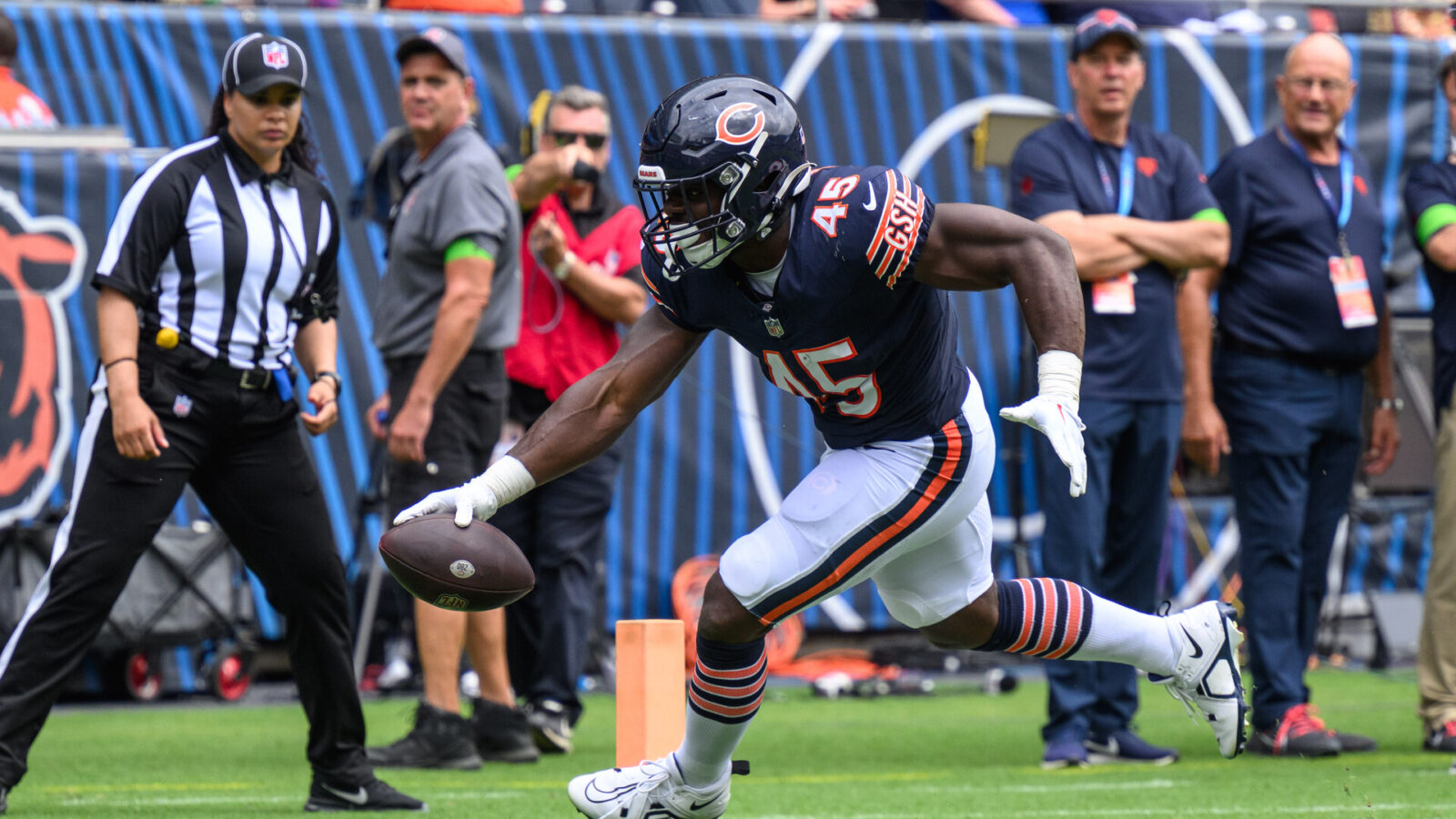 Aug 26, 2023; Chicago, Illinois, USA; Chicago Bears running back Robert Burns (45) runs into the end zone after a catch for a touchdown against the Buffalo Bills during the fourth quarter at Soldier Field.