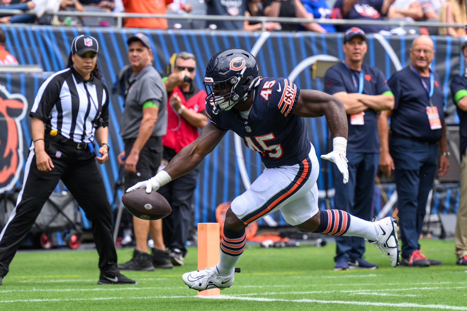 Aug 26, 2023; Chicago, Illinois, USA; Chicago Bears running back Robert Burns (45) runs into the end zone after a catch for a touchdown against the Buffalo Bills during the fourth quarter at Soldier Field.