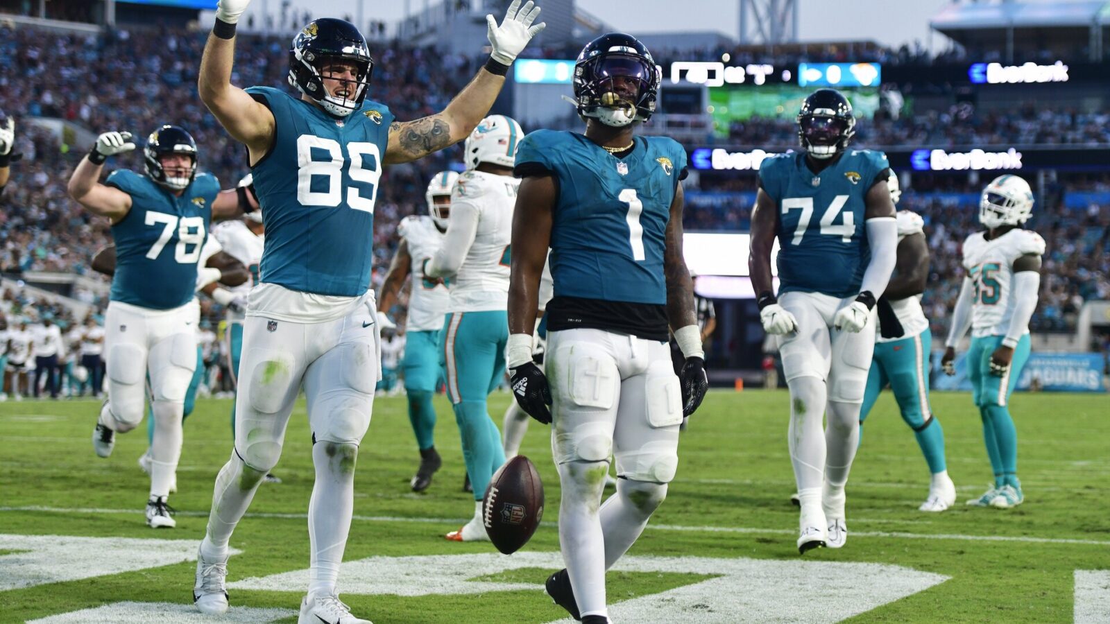 Jacksonville Jaguars running back Travis Etienne Jr. (1) scores a touchdown during the second quarter of a preseason matchup Saturday, Aug. 26, 2023 at EverBank Stadium in Jacksonville, Fla.