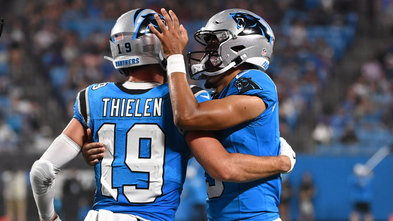 Aug 25, 2023; Charlotte, North Carolina, USA; Carolina Panthers wide receiver Adam Thielen (19) celebrates with quarterback Bryce Young (9) after scoring a touchdown in the first quarter at Bank of America Stadium.