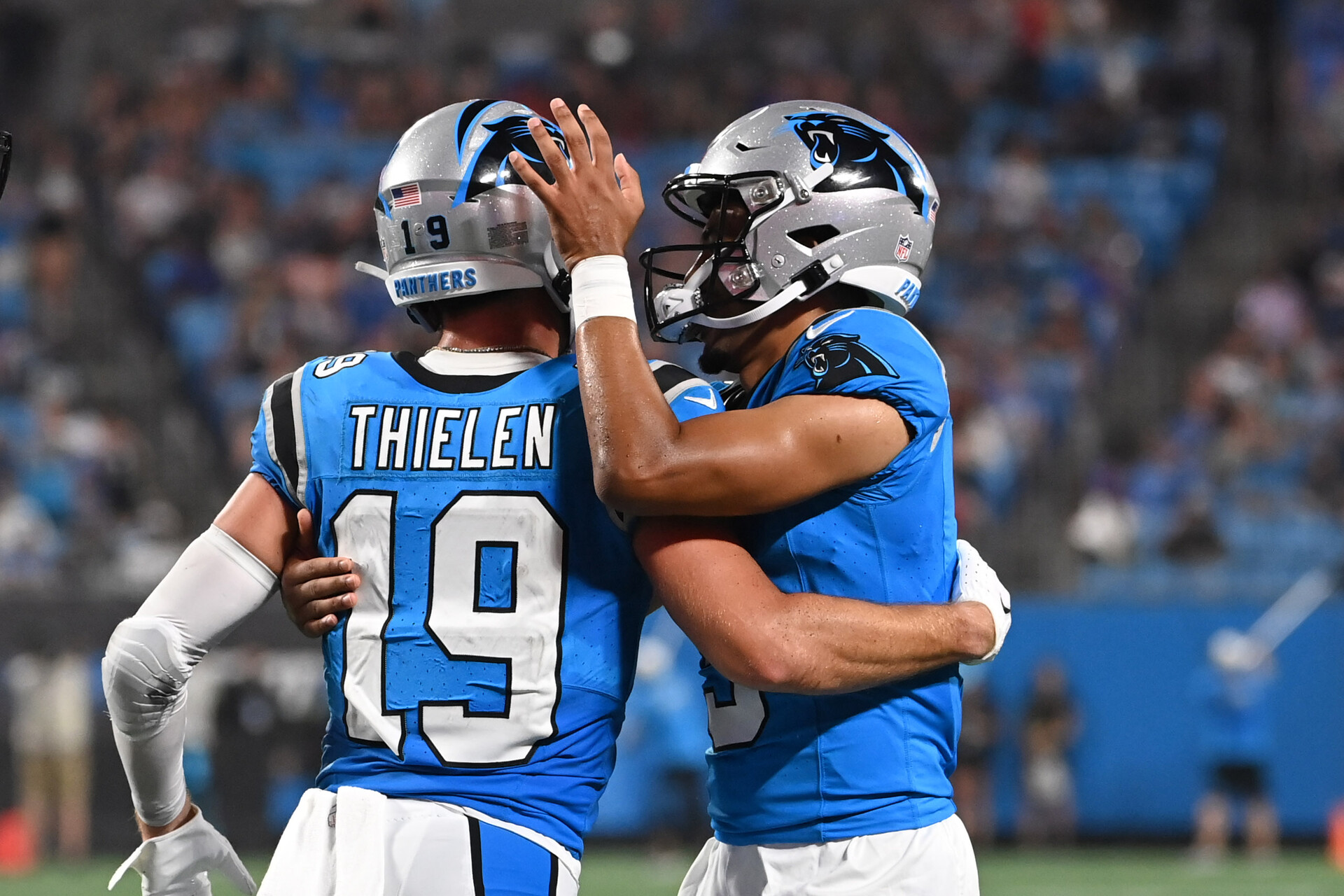 Aug 25, 2023; Charlotte, North Carolina, USA; Carolina Panthers wide receiver Adam Thielen (19) celebrates with quarterback Bryce Young (9) after scoring a touchdown in the first quarter at Bank of America Stadium.