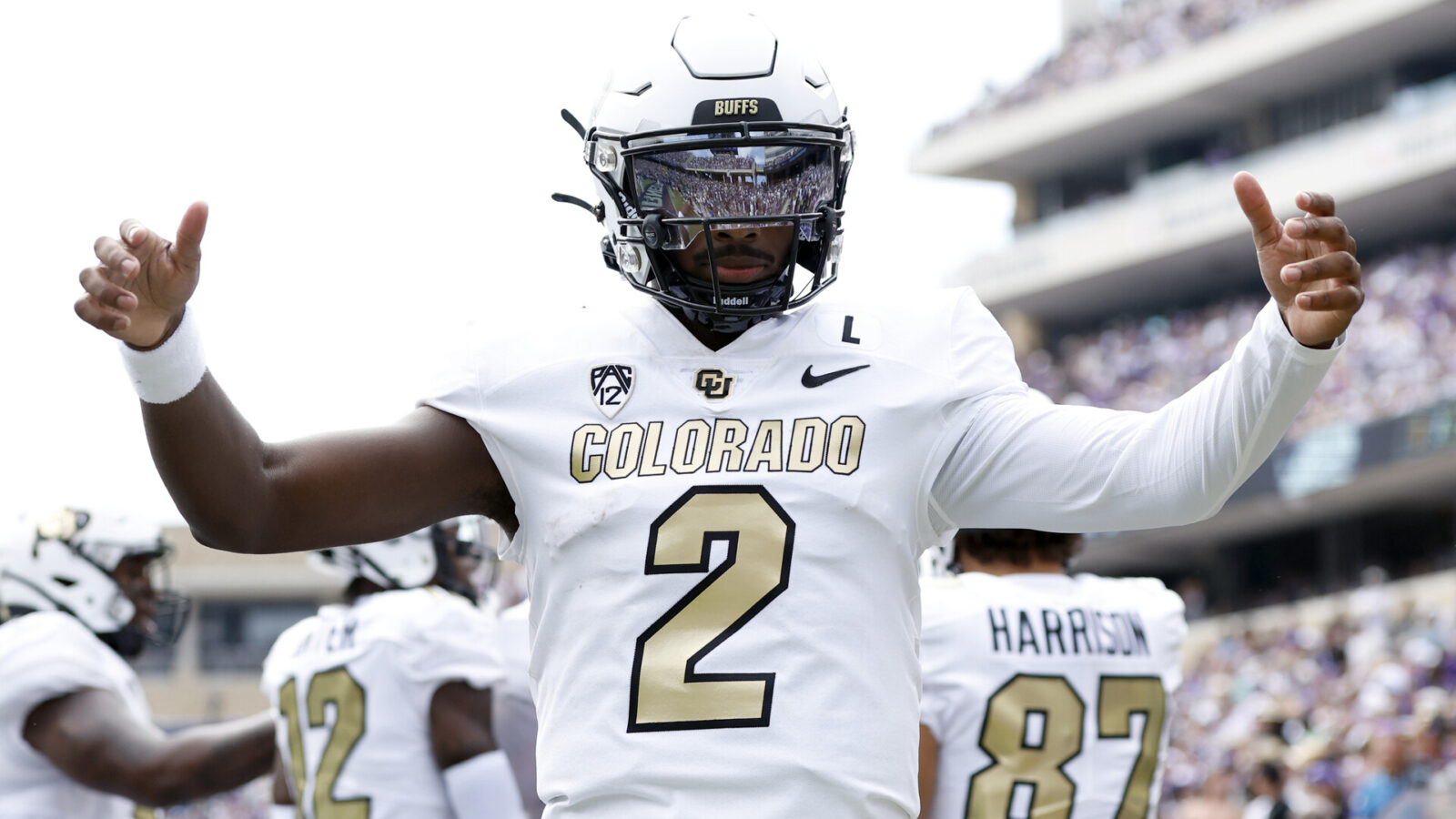 Colorado Buffaloes quarterback Shedeur Sanders (2) celebrates a touchdown in the first quarter against the TCU Horned Frogs at Amon G. Carter Stadium.