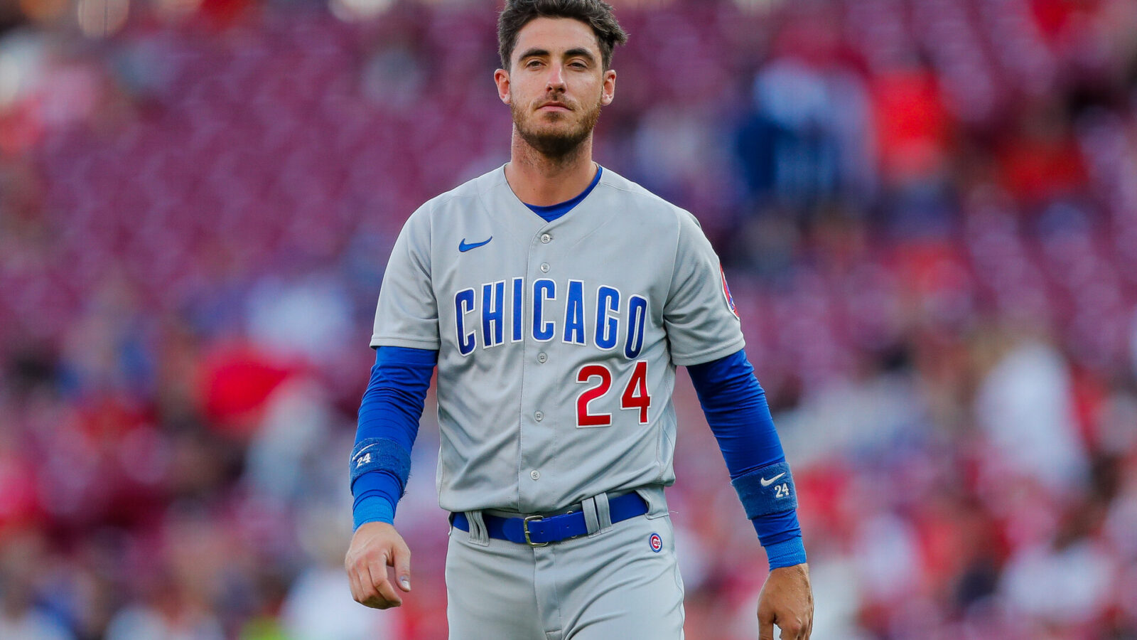 Sep 1, 2023; Cincinnati, Ohio, USA; Chicago Cubs first baseman Cody Bellinger (24) walks off the field in between innings during the first in the game against the Cincinnati Reds at Great American Ball Park.