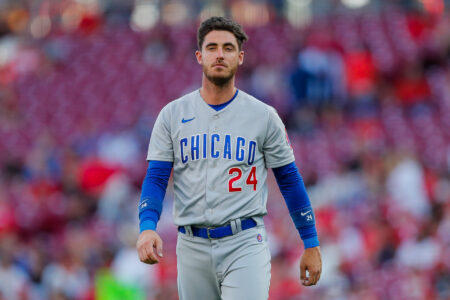 Sep 1, 2023; Cincinnati, Ohio, USA; Chicago Cubs first baseman Cody Bellinger (24) walks off the field in between innings during the first in the game against the Cincinnati Reds at Great American Ball Park.