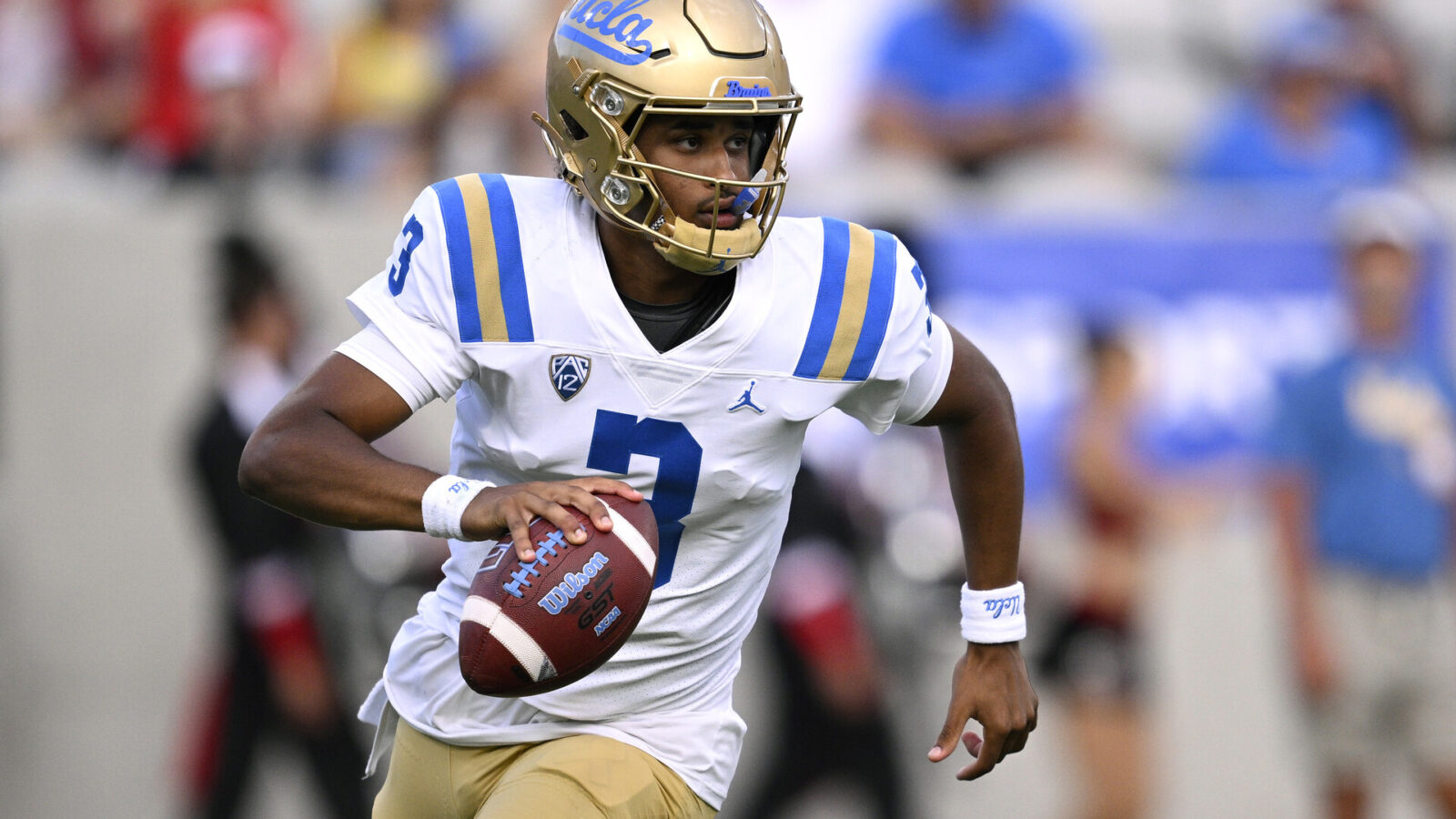 Sep 9, 2023; San Diego, California, USA; UCLA Bruins quarterback Dante Moore (3) runs with the ball against the San Diego State Aztecs during the first half at Snapdragon Stadium.