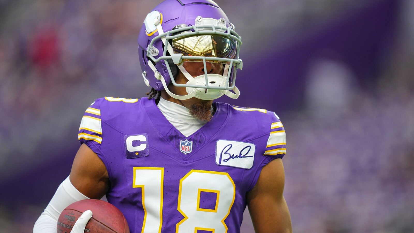 Minnesota Vikings wide receiver Justin Jefferson (18) warms up before the game against the Tampa Bay Buccaneers at U.S. Bank Stadium.
