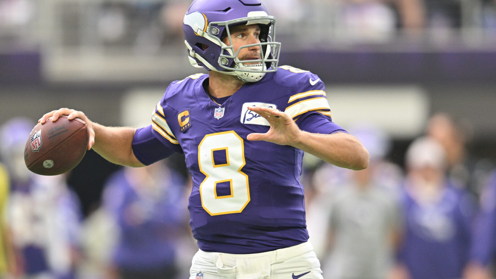 Minnesota Vikings quarterback Kirk Cousins (8) prepares to throw a pass against the Tampa Bay Buccaneers during the first quarter at U.S. Bank Stadium.