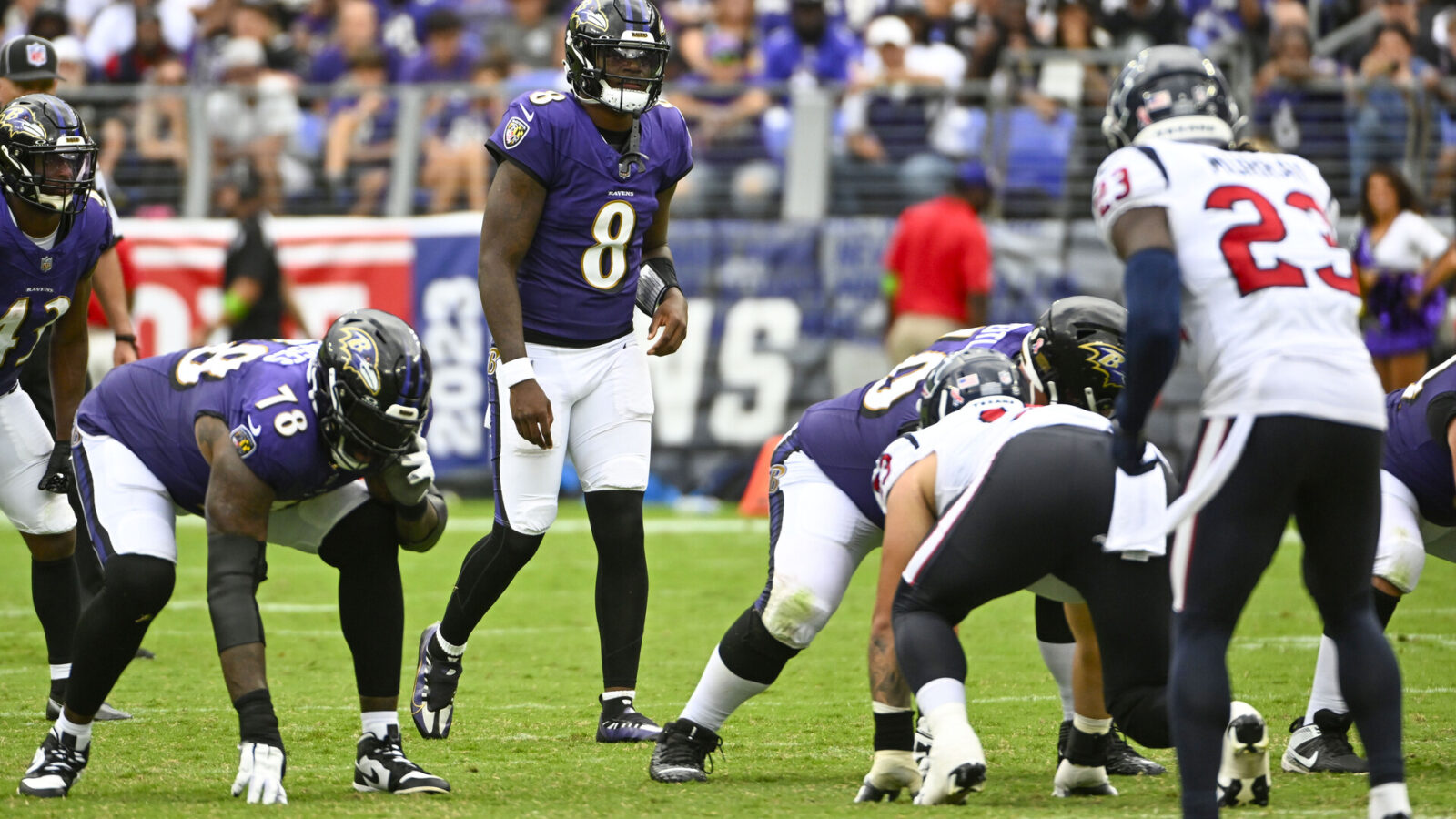 Sep 10, 2023; Baltimore, Maryland, USA; Baltimore Ravens quarterback Lamar Jackson (8) at the line of scrimmage against the Houston Texans during the second half at M&T Bank Stadium.