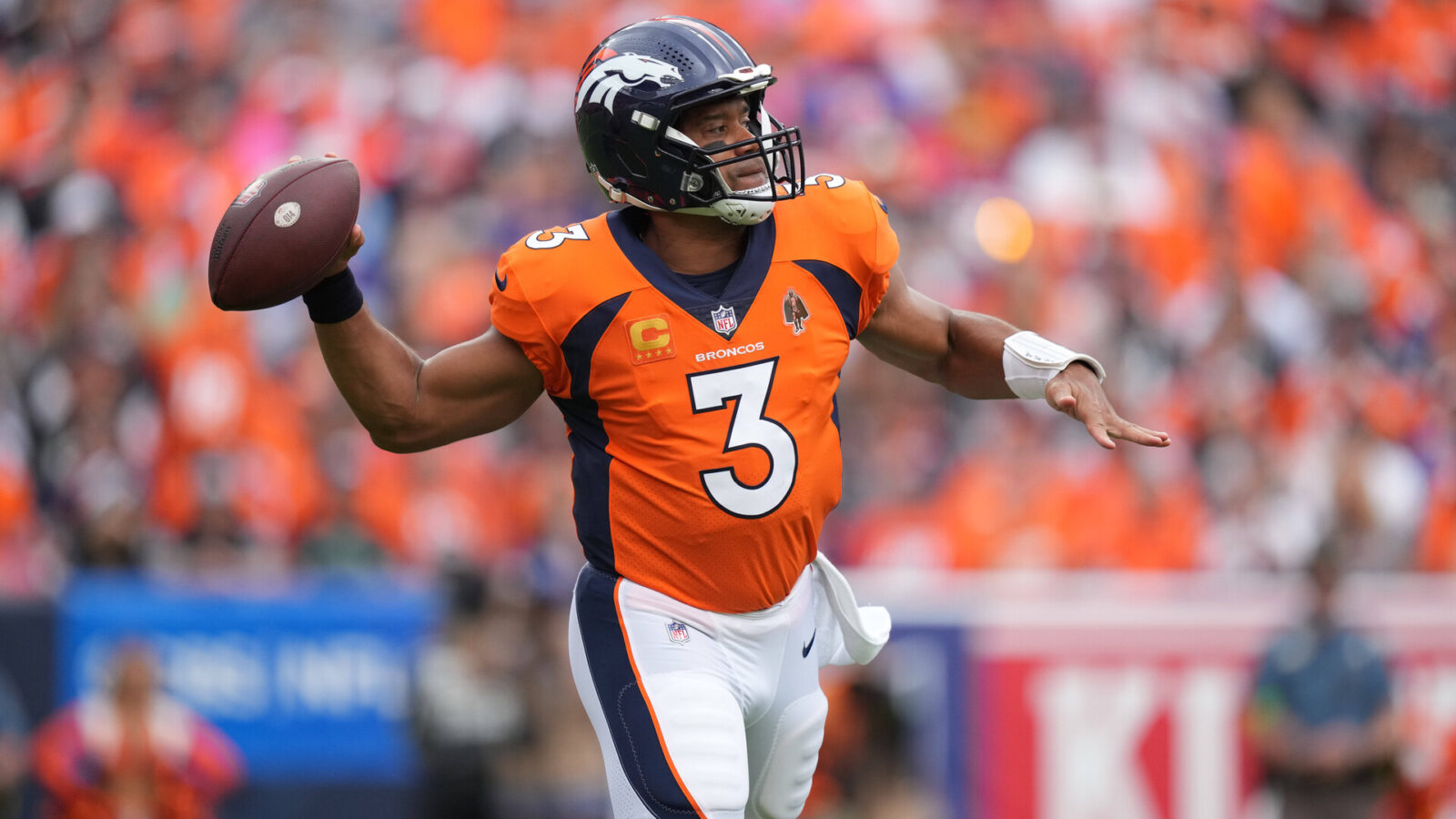 Sep 10, 2023; Denver, Colorado, USA; Denver Broncos quarterback Russell Wilson (3) prepares to pass in the first quarter against the Las Vegas Raiders at Empower Field at Mile High.