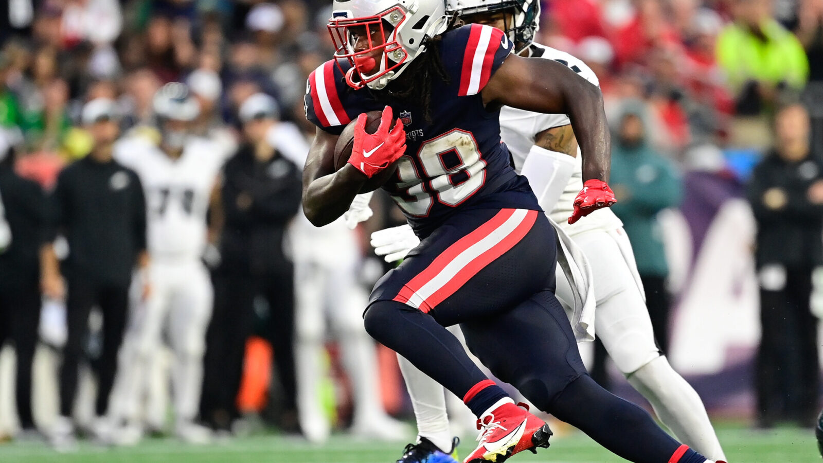 Sep 10, 2023; Foxborough, Massachusetts, USA; New England Patriots running back Rhamondre Stevenson (38) runs the ball against the Philadelphia Eagles during the second half at Gillette Stadium.