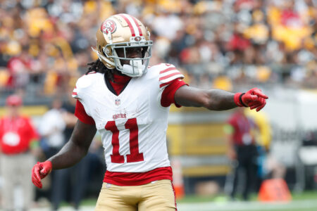 San Francisco 49ers wide receiver Brandon Aiyuk (11) gestures at the line of scrimmage against the Pittsburgh Steelers during the first quarter at Acrisure Stadium.