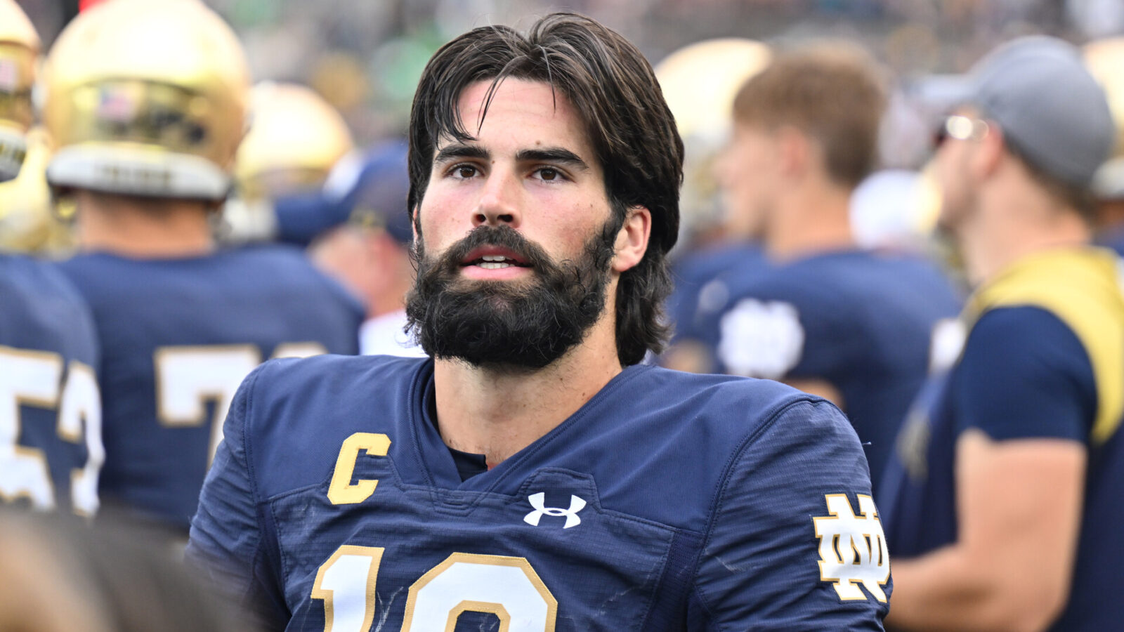 Notre Dame Fighting Irish quarterback Sam Hartman (10) watches from the bench in the closing minutes of the win over the Central Michigan Chippewas at Notre Dame Stadium.