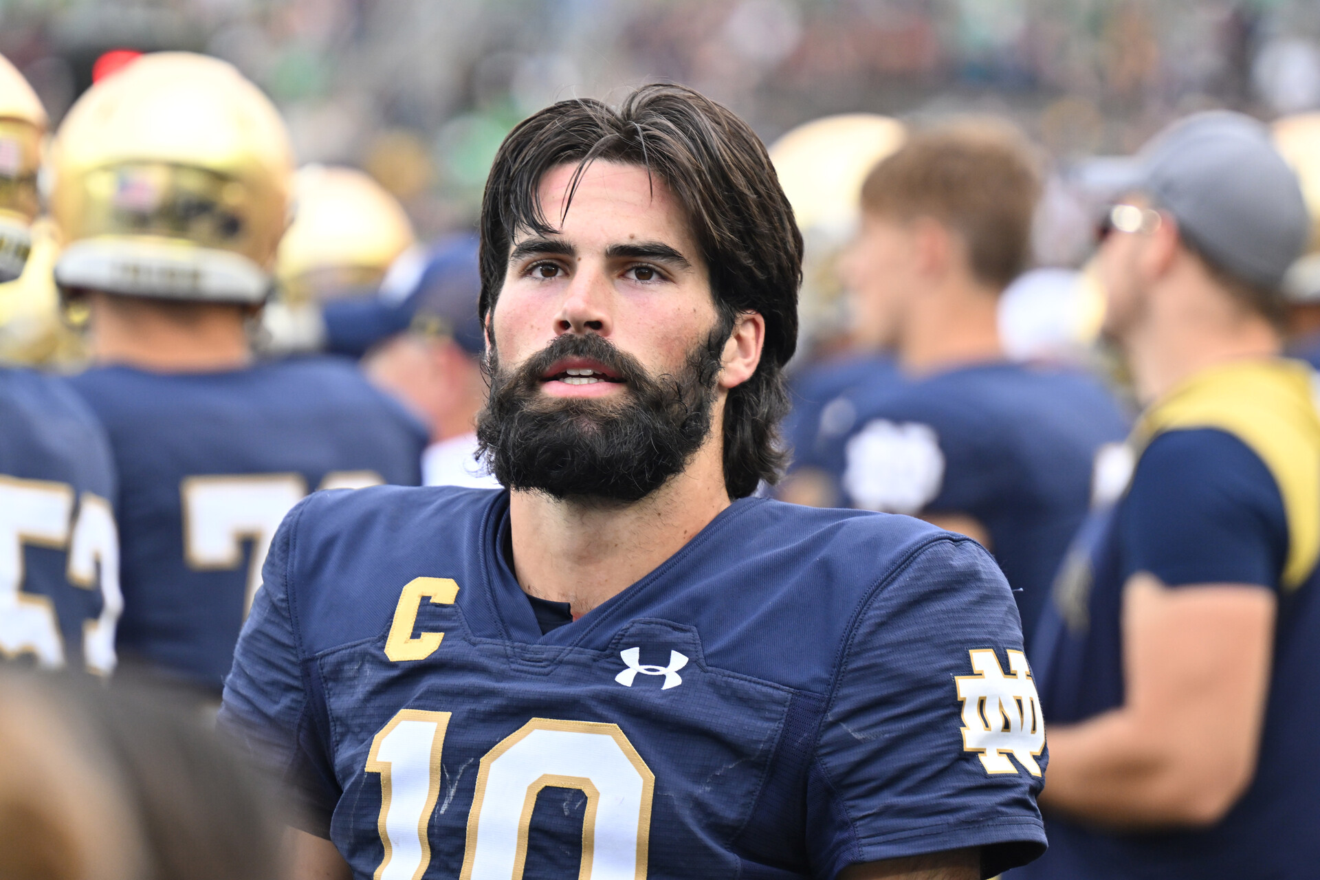 Notre Dame Fighting Irish quarterback Sam Hartman (10) watches from the bench in the closing minutes of the win over the Central Michigan Chippewas at Notre Dame Stadium.