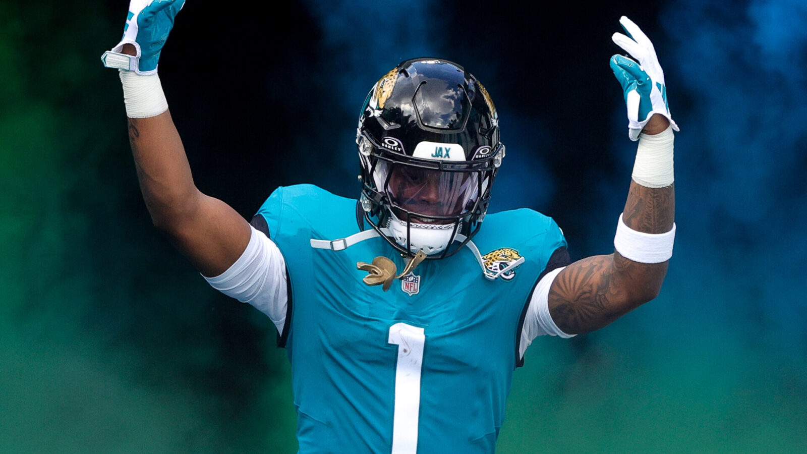 Jacksonville Jaguars running back Travis Etienne Jr. (1) is introduced before a game against the Kansas City Chiefs at EverBank Stadium.