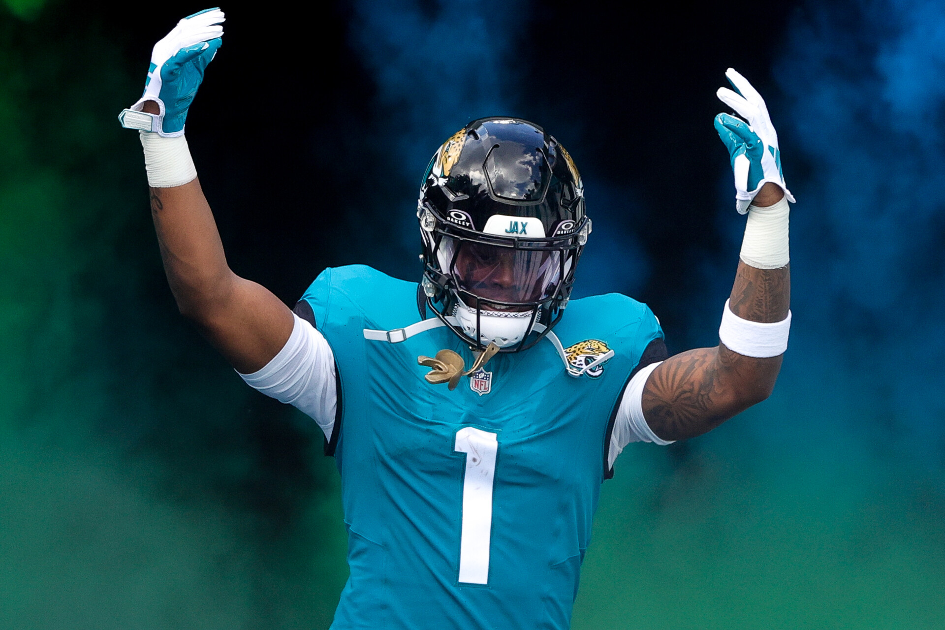 Jacksonville Jaguars running back Travis Etienne Jr. (1) is introduced before a game against the Kansas City Chiefs at EverBank Stadium.