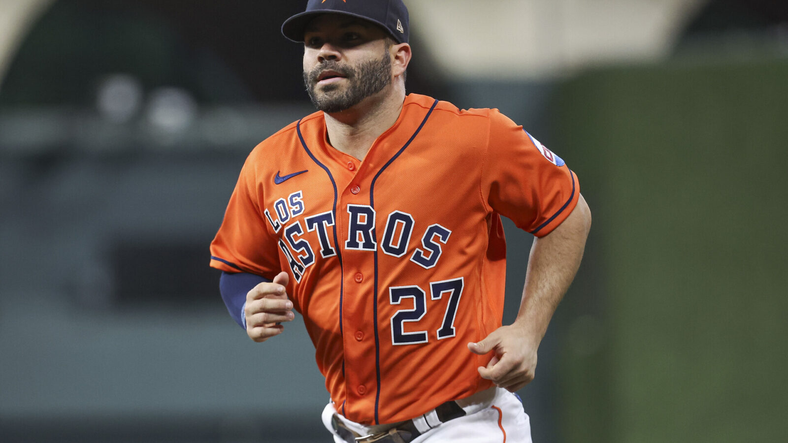 Sep 22, 2023; Houston, Texas, USA; Houston Astros second baseman Jose Altuve (27) wears a Los Astros jersey commemorating Hispanic Heritage Weekend before the game against the Kansas City Royals at Minute Maid Park.