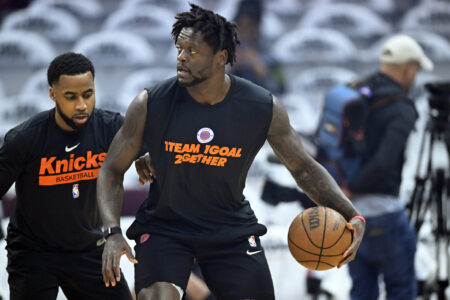 Apr 15, 2023; Cleveland, Ohio, USA; New York Knicks forward Julius Randle (right) warms up before game one of the 2023 NBA playoffs against the Cleveland Cavaliers at Rocket Mortgage FieldHouse.