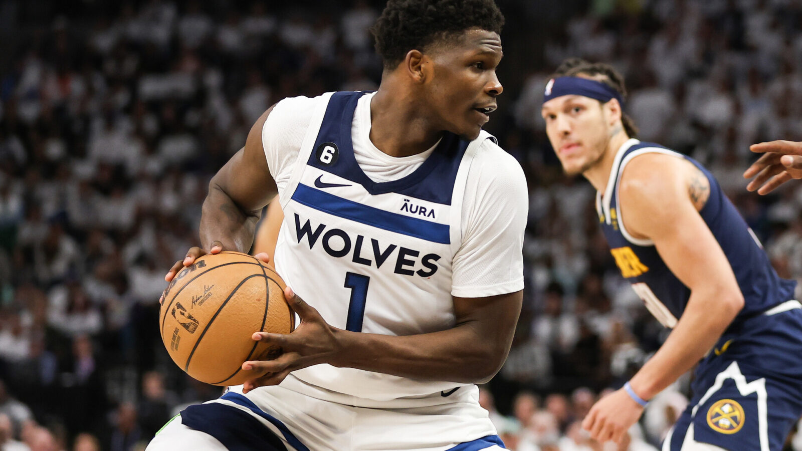 Minnesota Timberwolves guard Anthony Edwards (1) controls the ball against the Denver Nuggets during the fourth quarter of game four of the 2023 NBA Playoffs at Target Center.
