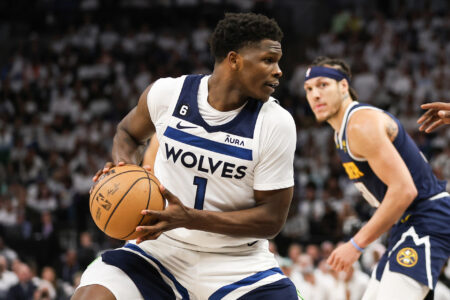Minnesota Timberwolves guard Anthony Edwards (1) controls the ball against the Denver Nuggets during the fourth quarter of game four of the 2023 NBA Playoffs at Target Center.