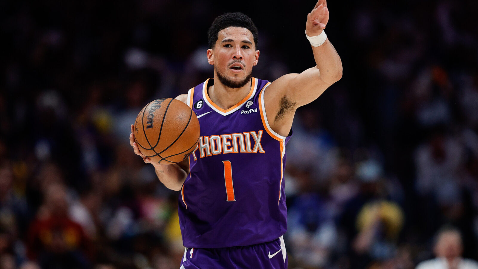 May 9, 2023; Denver, Colorado, USA; Phoenix Suns guard Devin Booker (1) controls the ball in the first quarter against the Denver Nuggets during game five of the 2023 NBA playoffs at Ball Arena.