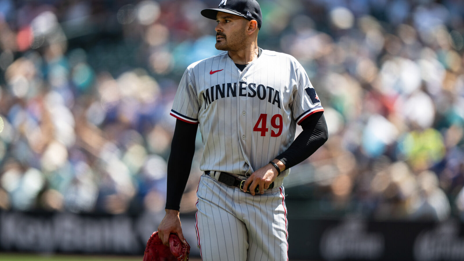 Jul 20, 2023; Seattle, Washington, USA; Minnesota Twins starting pitcher Pablo Lopez (49) walks off the field during a game against the Seattle Mariners at T-Mobile Park.