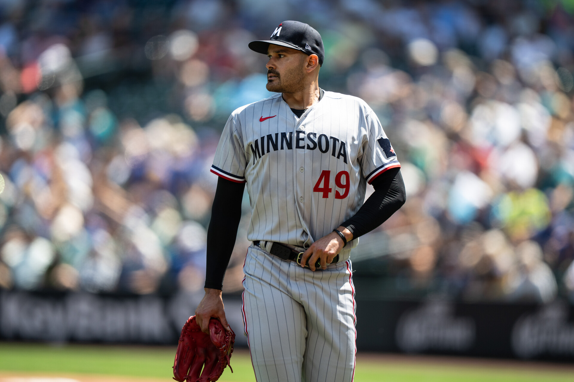 Jul 20, 2023; Seattle, Washington, USA; Minnesota Twins starting pitcher Pablo Lopez (49) walks off the field during a game against the Seattle Mariners at T-Mobile Park.