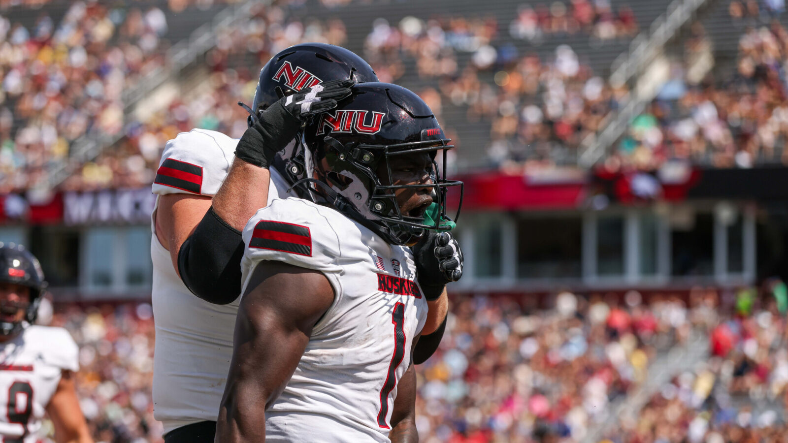 Northern Illinois Huskies running back Antario Brown (1) reacts after scoring a touchdown during the first half against the Boston College Eagles at Alumni Stadium.