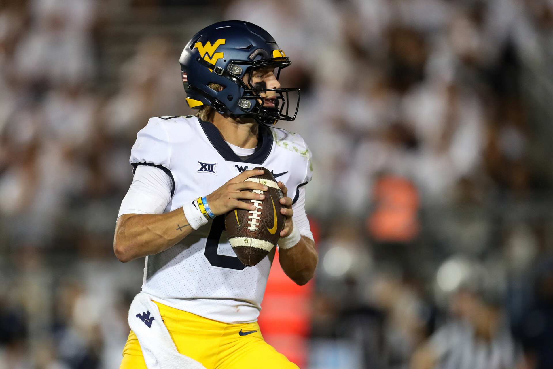West Virginia Mountaineers quarterback Garrett Greene (6) drops back in the pocket during the fourth quarter against the Penn State Nittany Lions at Beaver Stadium. Penn State defeated West Virginia 38-15.