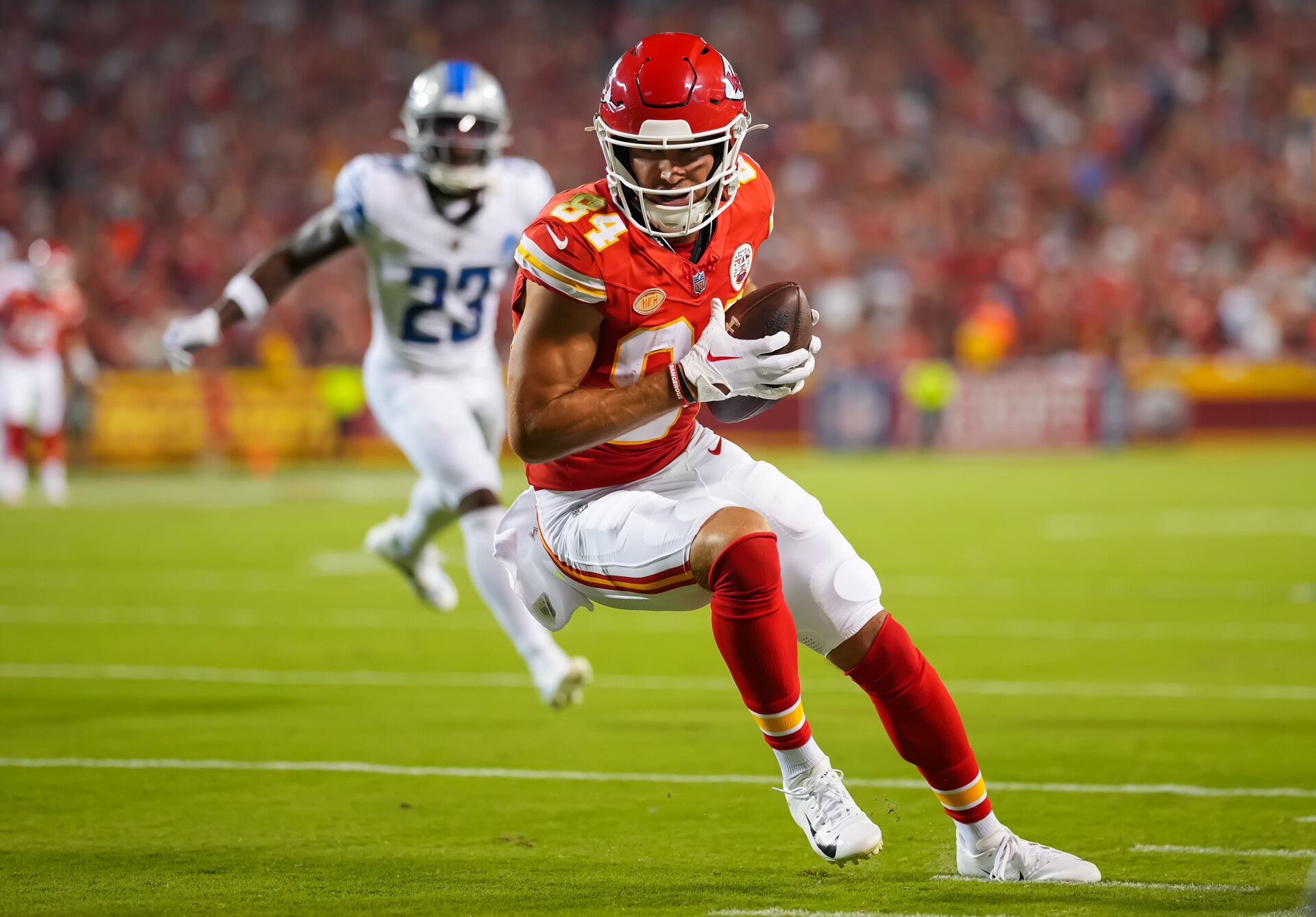 Sep 7, 2023; Kansas City, Missouri, USA; Kansas City Chiefs wide receiver Justin Watson (84) catches a pass against the Detroit Lions during the first half at GEHA Field at Arrowhead Stadium.