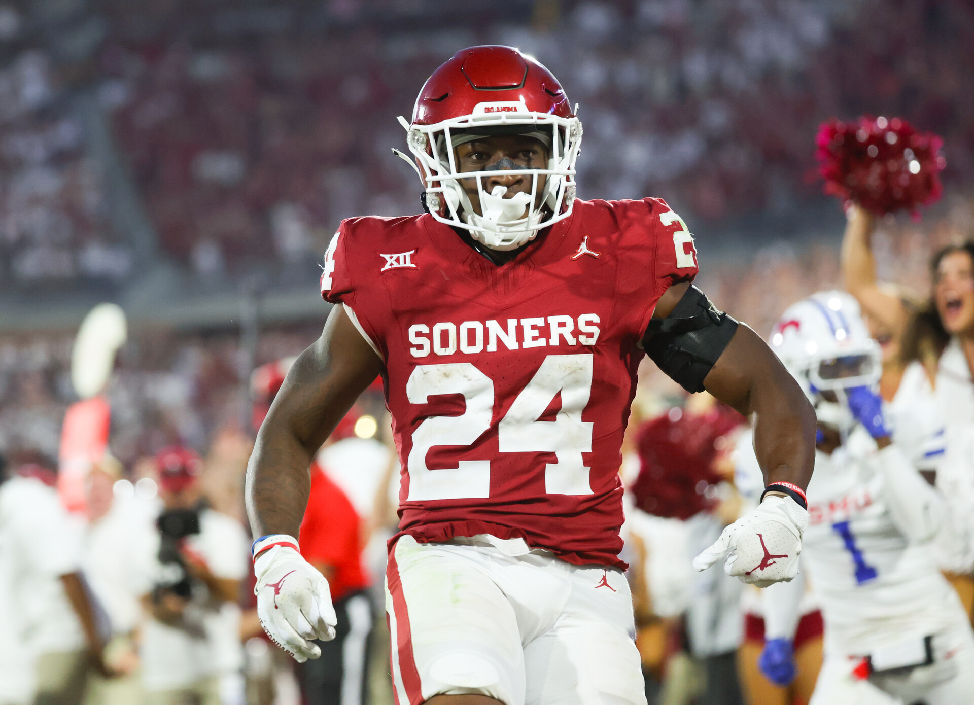 Oklahoma Sooners running back Marcus Major (24) reacts after scoring a touchdown during the fourth quarter against the Southern Methodist Mustangs at Gaylord Family-Oklahoma Memorial Stadium.