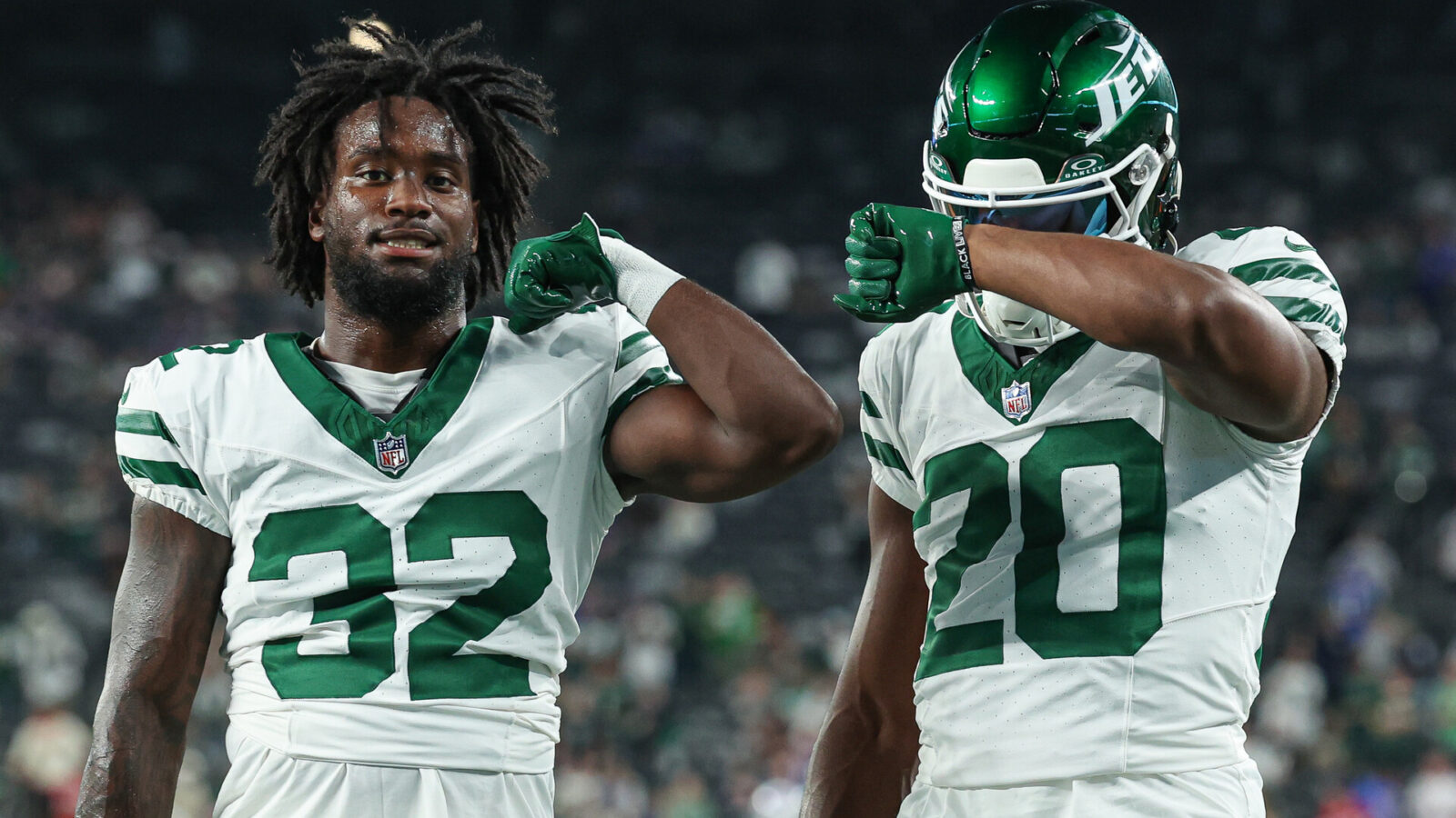Sep 11, 2023; East Rutherford, New Jersey, USA; New York Jets running back Michael Carter (32) and running back Breece Hall (20) pose for a photo before the game against the Buffalo Bills at MetLife Stadium.