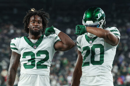 Sep 11, 2023; East Rutherford, New Jersey, USA; New York Jets running back Michael Carter (32) and running back Breece Hall (20) pose for a photo before the game against the Buffalo Bills at MetLife Stadium.