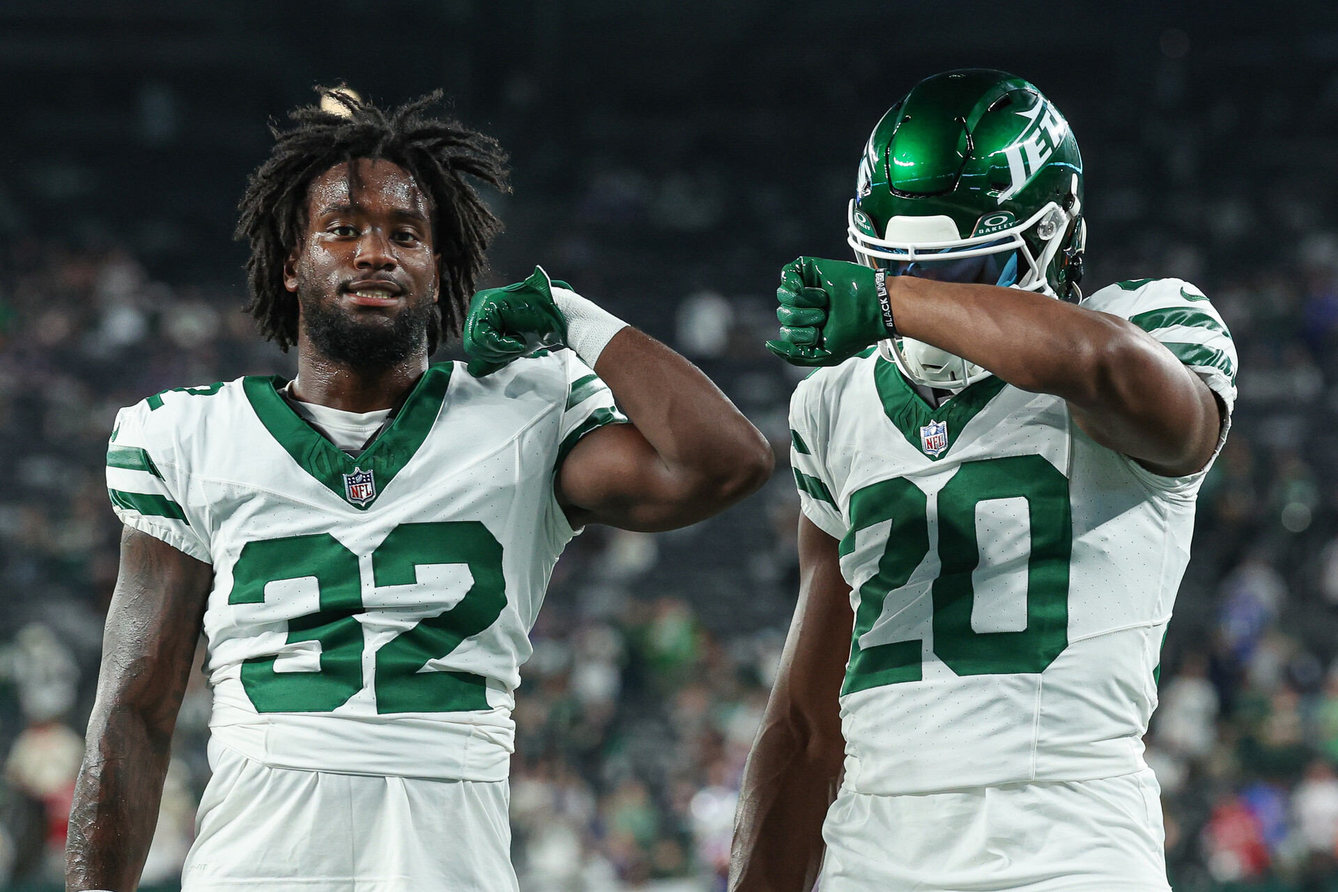 Sep 11, 2023; East Rutherford, New Jersey, USA; New York Jets running back Michael Carter (32) and running back Breece Hall (20) pose for a photo before the game against the Buffalo Bills at MetLife Stadium.