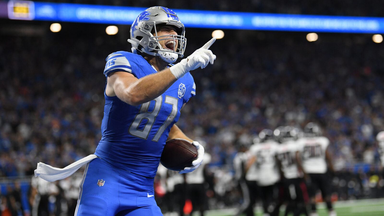 Detroit Lions tight end Sam LaPorta (87) celebrates after catching a touchdown pass against the Atlanta Falcons in the second quarter at Ford Field.