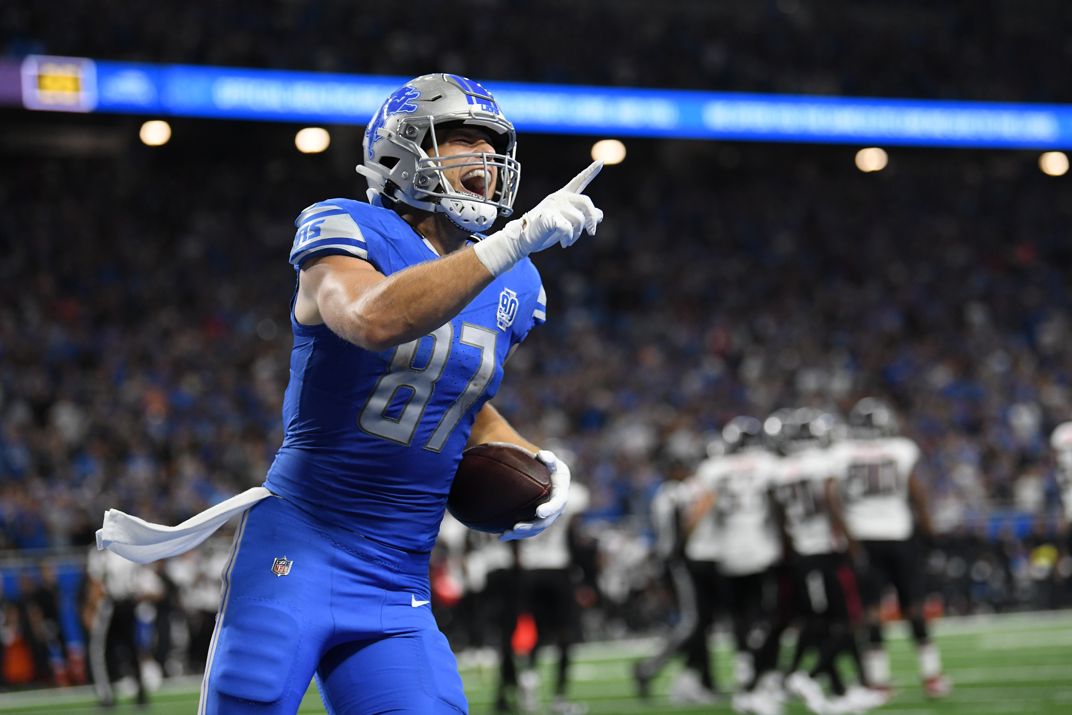 Detroit Lions tight end Sam LaPorta (87) celebrates after catching a touchdown pass against the Atlanta Falcons in the second quarter at Ford Field.