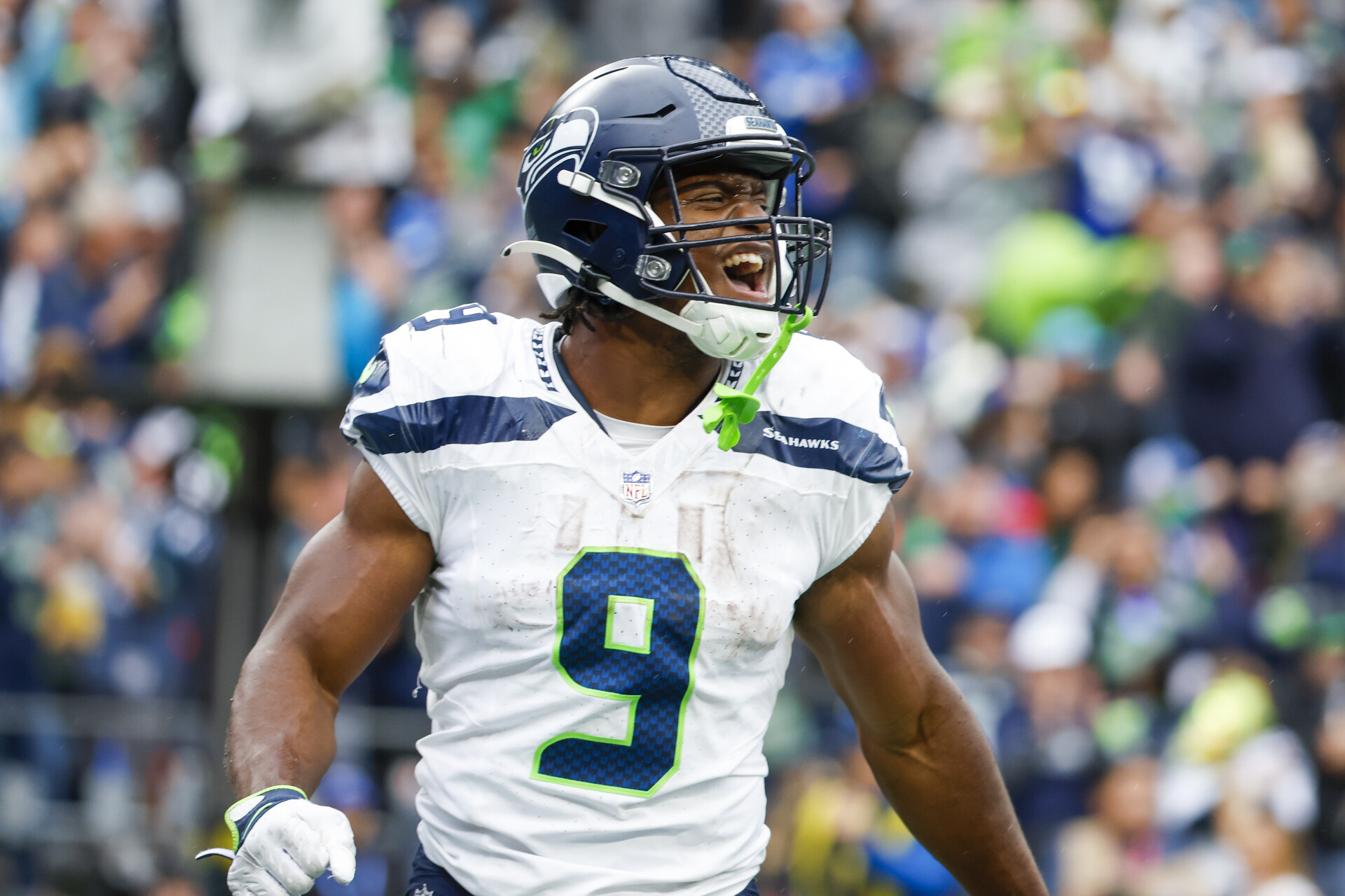 Sep 24, 2023; Seattle, Washington, USA; Seattle Seahawks running back Kenneth Walker III (9) reacts after rushing for a touchdown against the Carolina Panthers during the third quarter at Lumen Field.