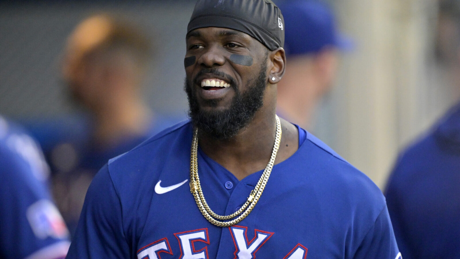 Sep 27, 2023; Anaheim, California, USA; Texas Rangers right fielder Adolis Garcia (53) gets ready in the dugout before the game against the Los Angeles Angels at Angel Stadium.