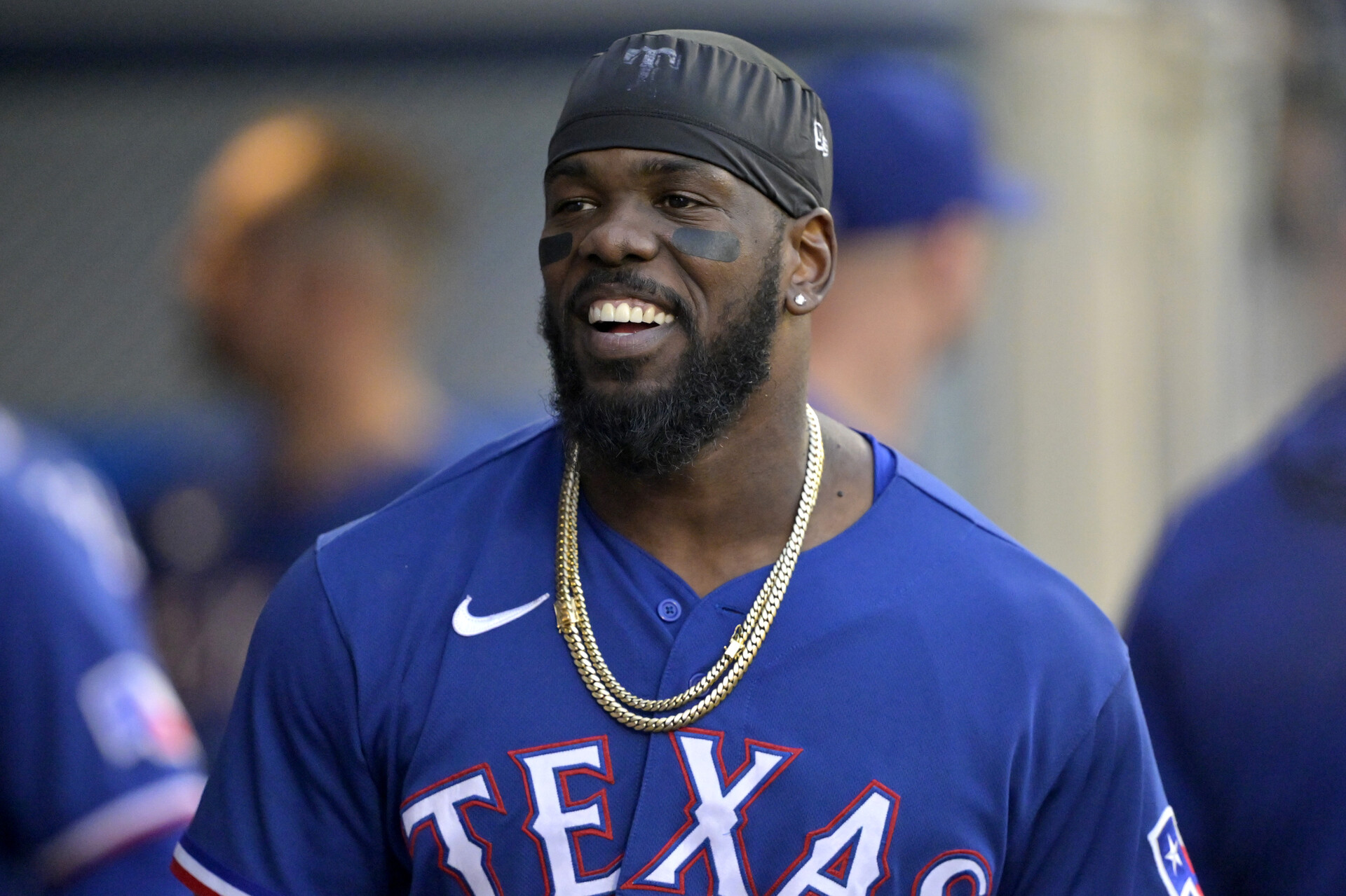 Sep 27, 2023; Anaheim, California, USA; Texas Rangers right fielder Adolis Garcia (53) gets ready in the dugout before the game against the Los Angeles Angels at Angel Stadium.